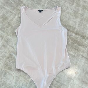Express soft pink v neck bodysuit. Small. Worn once.